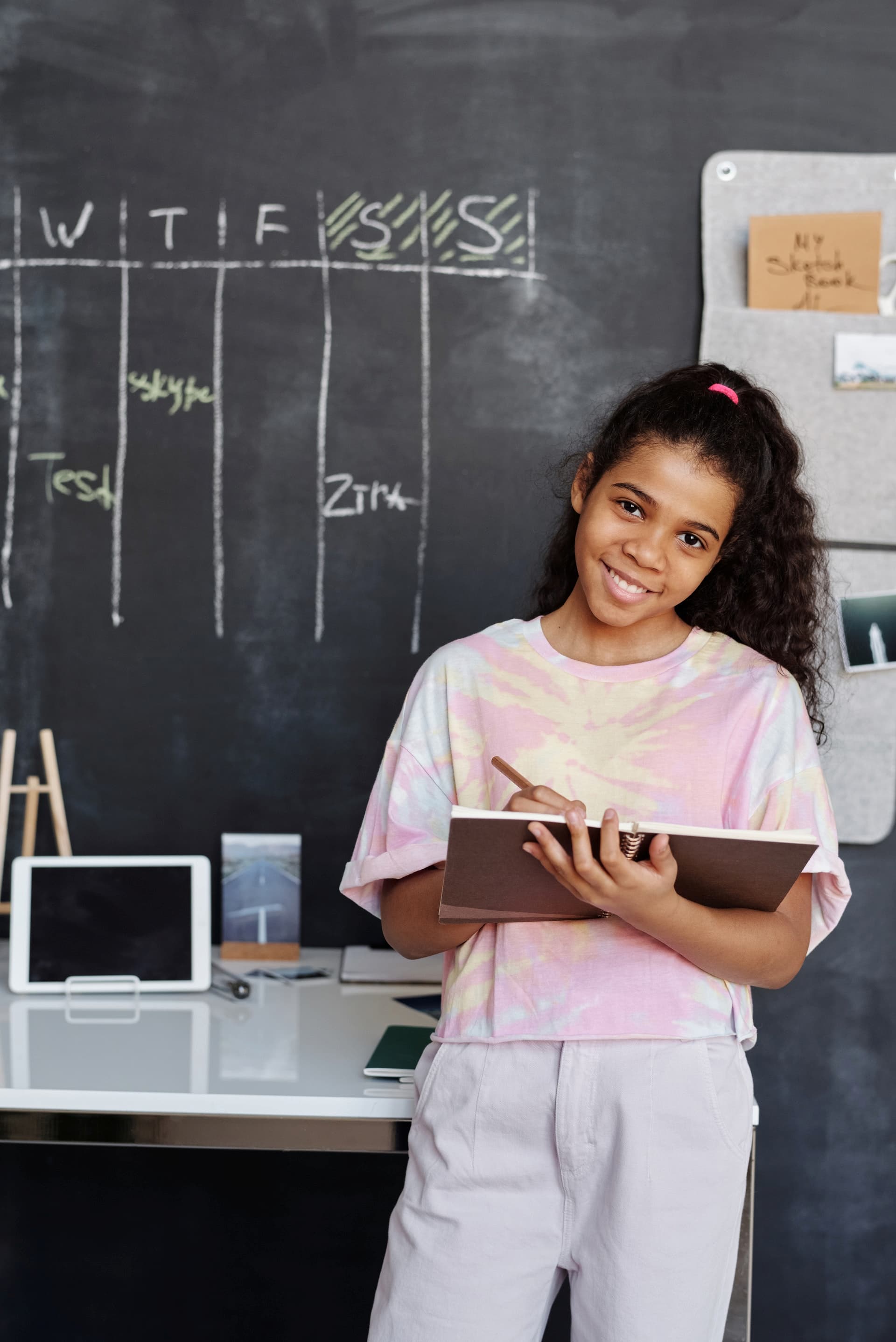 school girl with notepad